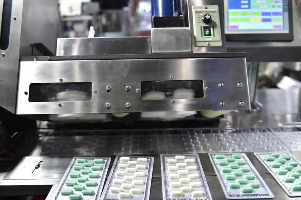 Illustration d'une machine utilisé pour produire des compléments alimentaires